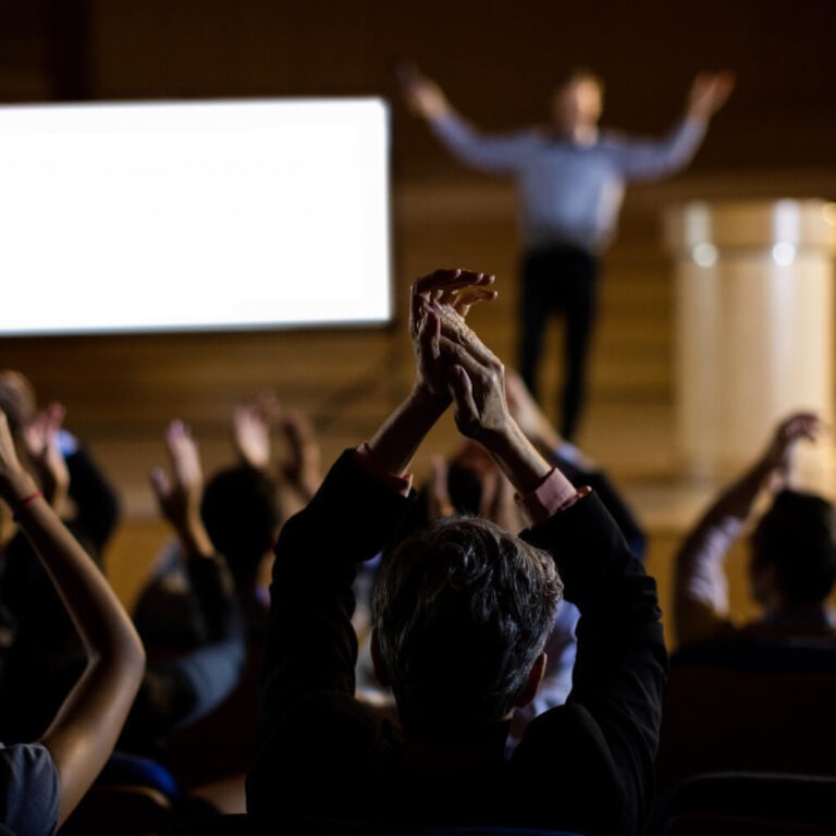 audience-applauding-speaker-after-conference-presentation (1)